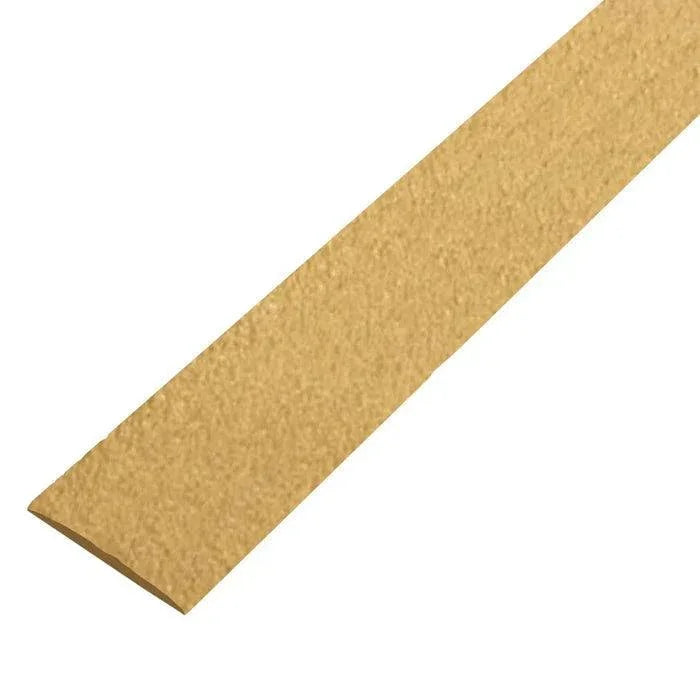 Close-up of yellow anti-slip grit surface on GRP decking strip - finishings UK