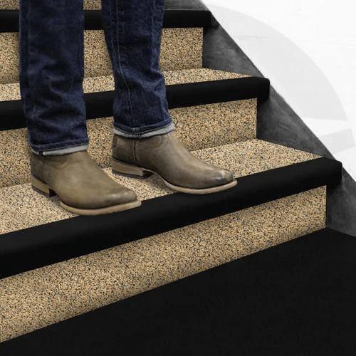 Anti-Slip GRP Stair Treads With Black Nosing For Indoor or Outdoor Stairs black color Close-up of anti-slip GRP stair treads with black nosing, showcasing the textured surface for maximum grip and safety.- finishings UK