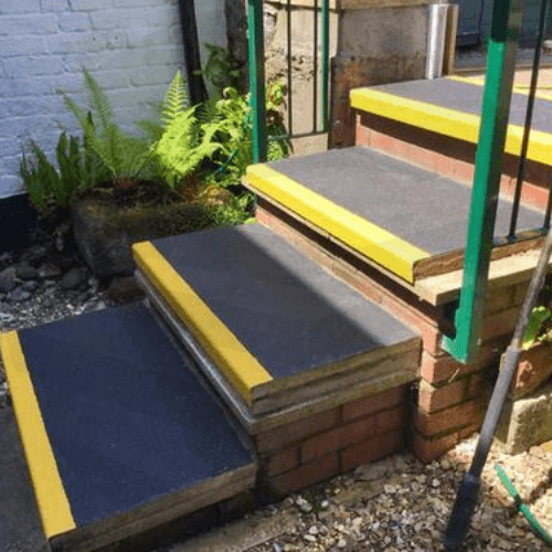 Heavy Duty Anti Slip GRP Stair Treads For Frosty And Oily Conditions black with yellow edge- finishings UK
