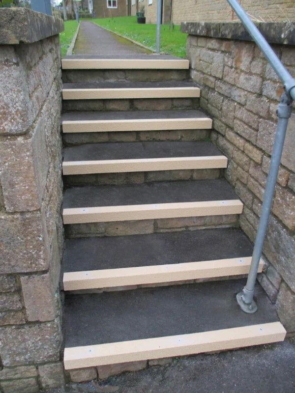 Medium Grit Anti-Slip Stair Nosing white color front stair view- finishings UK