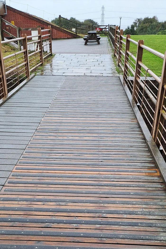 Close-up of Medium Grit Non-Slip Decking Strips 90mm showing textured surface for superior grip.